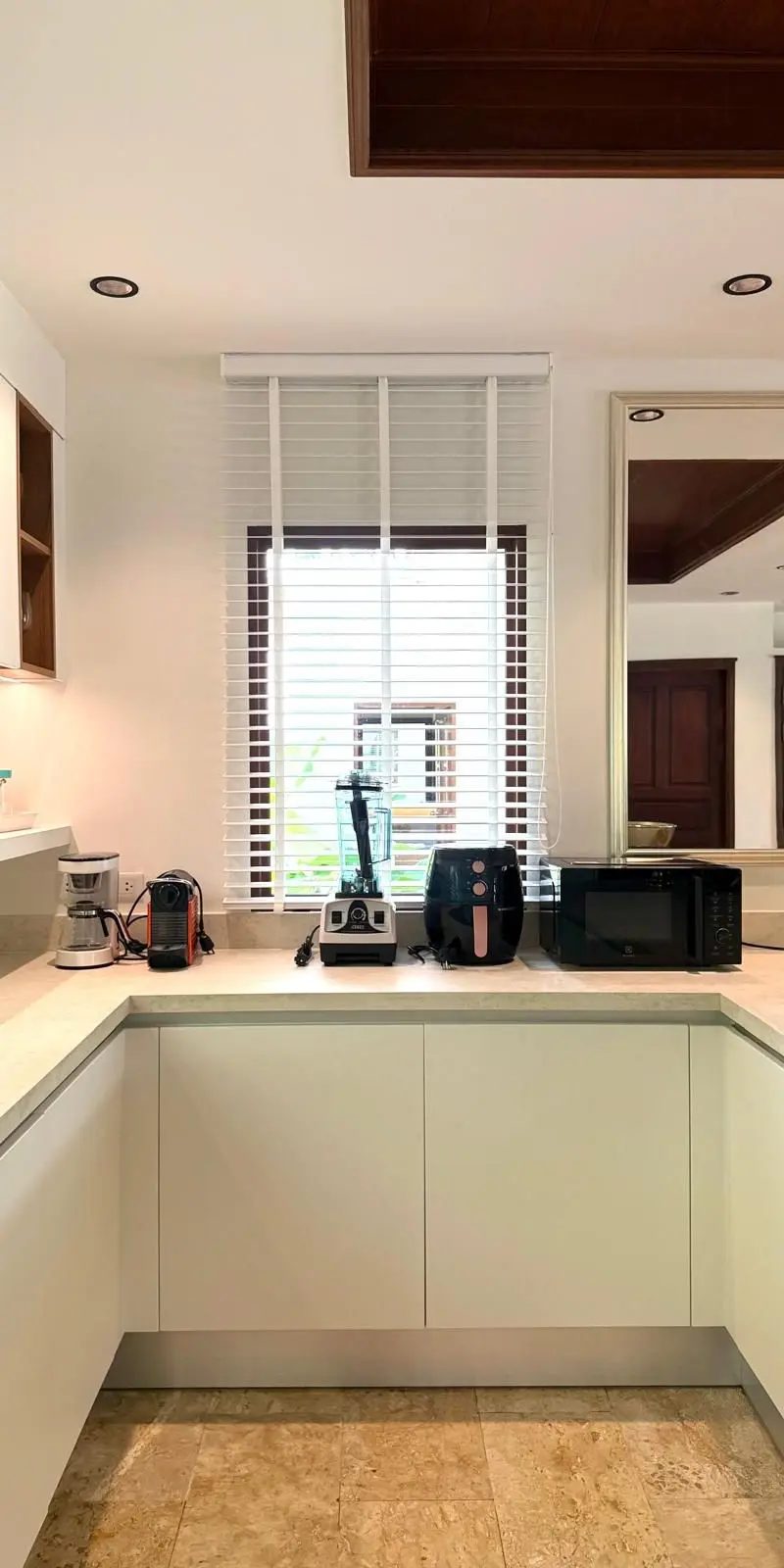 Prep / utility kitchen with coffee machine, blender and air fryer