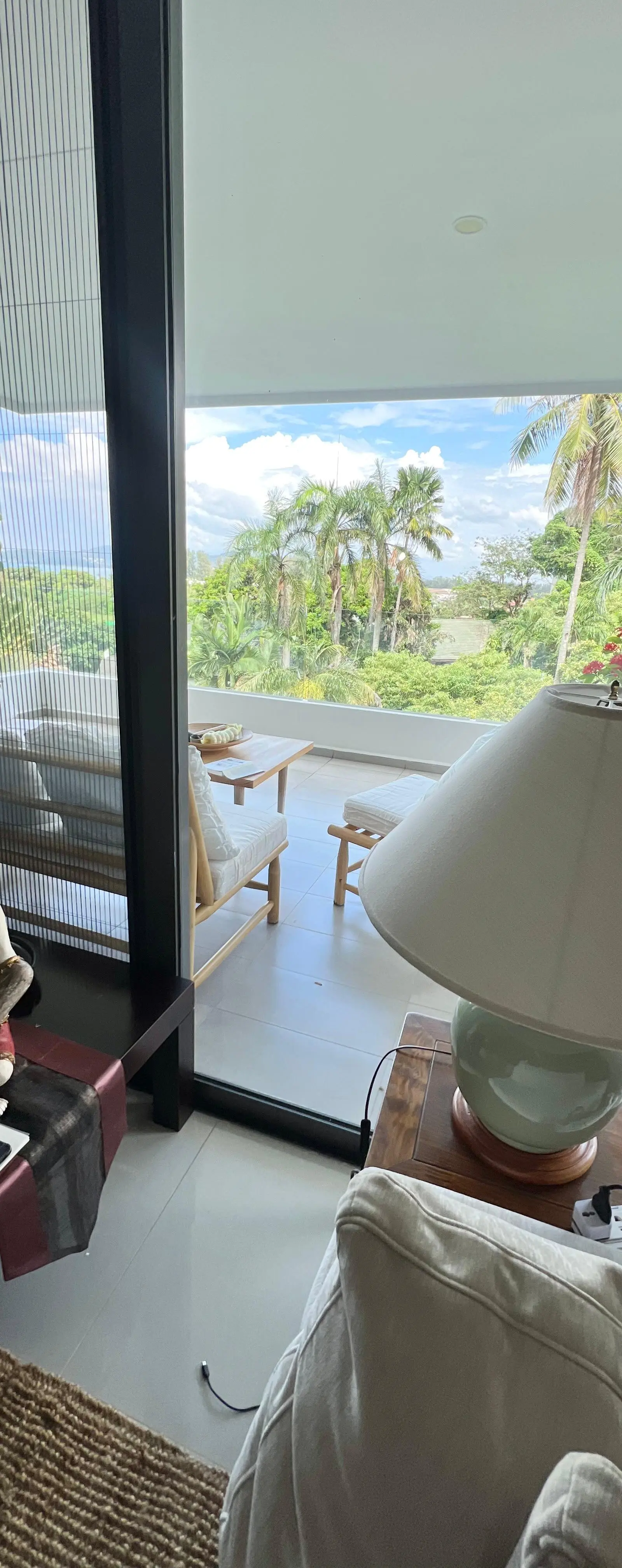 Terrace with bamboo lounge chair and side table